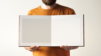 Mock up design templates. photo album in hand