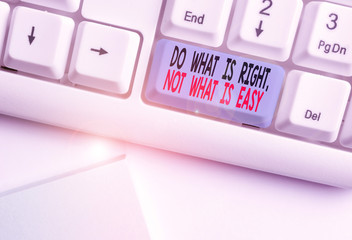 Writing note showing Do What Is Right Not What Is Easy. Business concept for willing to stand up...