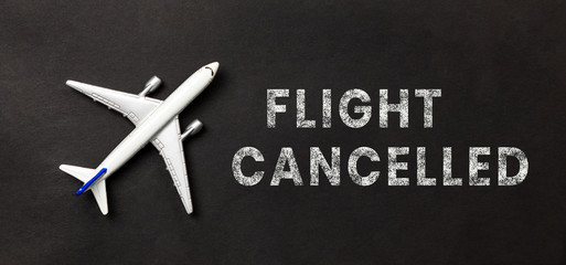 plane on a black background with text flight cancelled