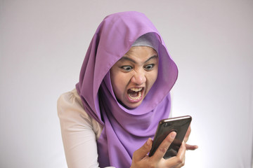 Young Woman Angry by Phone Call, Screaming on Phone