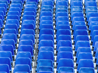 tribune with blue chairs