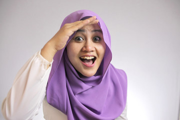 Muslim Woman Looking Far Ahead With Shocked Surprised Expression