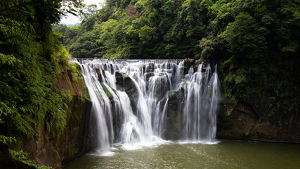 Fototapeta na wymiar Shifen Waterfall, also known as Niagara of Taiwan