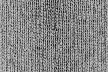White natural texture of knitted wool textile material background. White cotton fabric woven canvas texture
