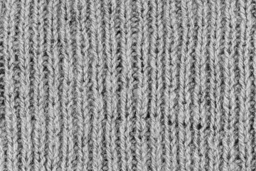 White natural texture of knitted wool textile material background. White cotton fabric woven canvas texture