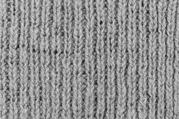 White natural texture of knitted wool textile material background. White cotton fabric woven canvas texture