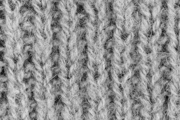 White natural texture of knitted wool textile material background. White cotton fabric woven canvas texture
