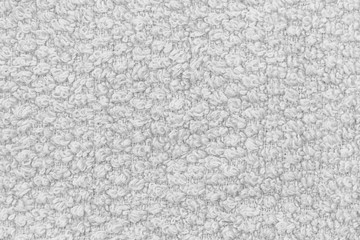 White natural texture of knitted wool textile material background. White cotton fabric woven canvas texture