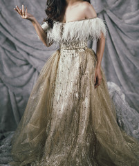 elegant woman in golden yellow long gown evening dress