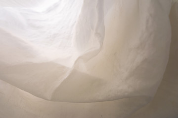 Obraz premium Abstract pastel background. Delicate fabric texture, soft folds. Soft focus.