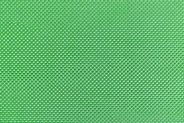 Texture of green textile fabric material with pattern background
