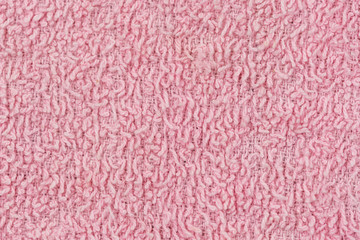 Texture of pink knitted textile material background