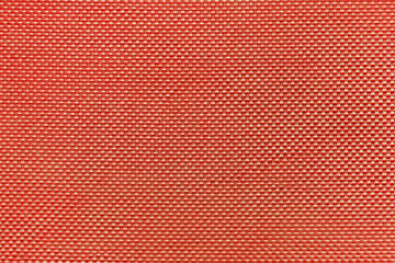 Texture of red textile fabric material with pattern background