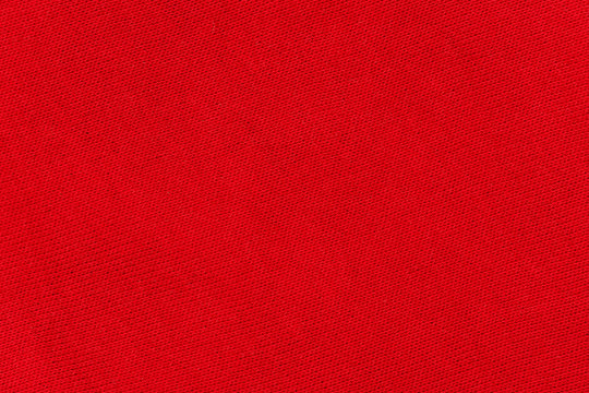 Texture of red textile fabric material with pattern background