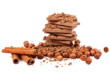Chocolate tiles and nuts on white background