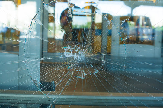 Broken Glass Pane. The broken glass window the shop
