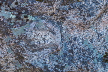 Old cracked stone wall as a background
