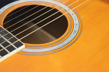 Acoustic guitar on isolated background, musical instruments.