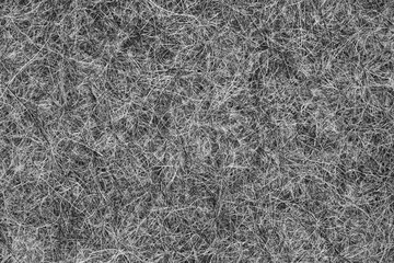Extruded hair felt closeup background texture. sheep wool for felt boots