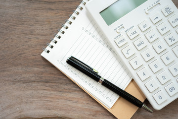 Keypad TAX button For tax calculation. Easy to calculate. on White calculator wood background using...