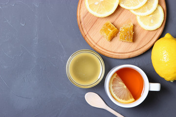 tea, honey and lemon on the table top view.