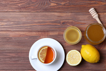 Obraz na płótnie Canvas tea, honey and lemon on the table top view.