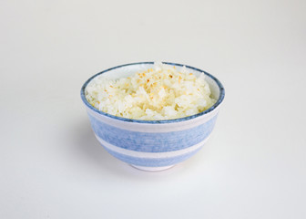 Japanese ripe rice with sesame in ceramic cup