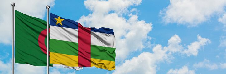 Algeria and Central African Republic flag waving in the wind against white cloudy blue sky together. Diplomacy concept, international relations.