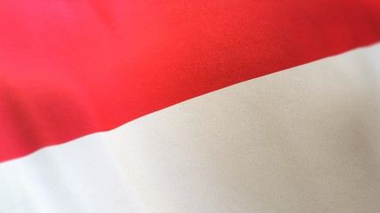 3D rendering of the national flag of Monaco waving in the wind. The banner/emblem is made of realistic satin texture and rendered in a daylight situation. 