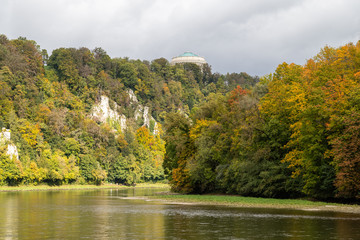 Fototapeta na wymiar Nature reserve at Danube river breakthrough near Kelheim, Bavaria, Germany in autumn with limestone rock formations and plants with colorful leaves, autumnal impressions