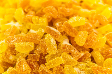 background - golden yellow translucent gumdrops in sugar