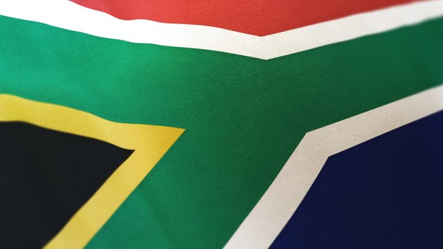 3D rendering of the national flag of South Africa waving in the wind. The banner/emblem is made of realistic satin texture and rendered in a daylight situation. 