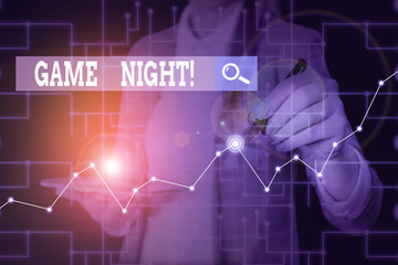 Writing note showing Game Night. Business concept for usually its called on adult play dates like poker with friends Woman wear formal work suit present using smart latest device