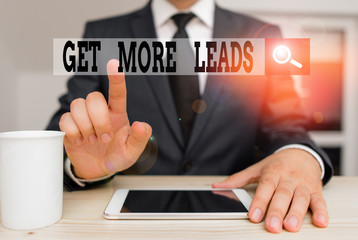 Conceptual hand writing showing Get More Leads. Concept meaning to have more customers and improve your target sales Male human wear formal clothes present use hitech smartphone