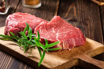  Fresh raw beef steak sirloin with rosemary © Sławomir Fajer