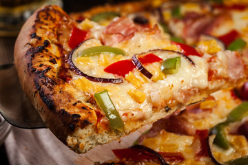 Homemade pizza with bacon, paprika and corn