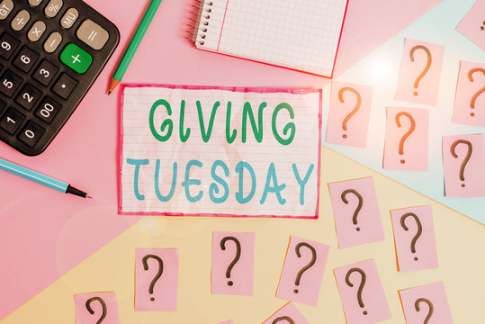 Handwriting text Giving Tuesday. Conceptual photo international day of charitable giving Hashtag activism Mathematics stuff and writing equipment above pastel colours background