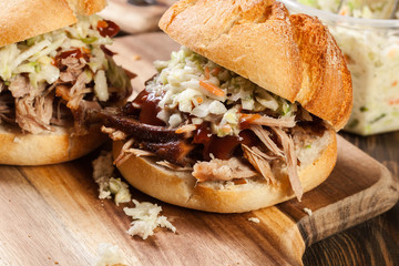 Homemade pulled pork burger with coleslaw salad