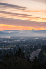 Morning commuters at foggy sunrise over the Columbia River, Portland Oregon
