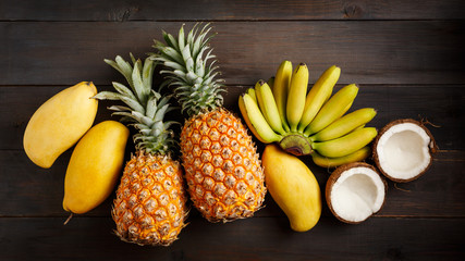 Various tropical fruits, bananas, pineapples mango coconut