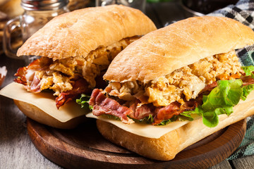 Ciabatta sandwich with smoked bacon and eggs