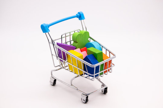 Colorful blocks in a small shopping cart