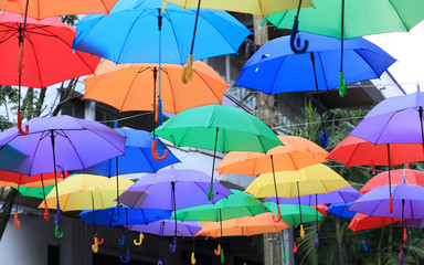 Street decorated with colorful umbrellas. Multi colored umbrellas is beautiful for background.
