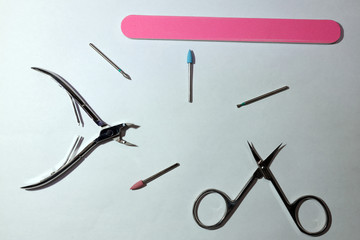 set of manicure tools on a white background