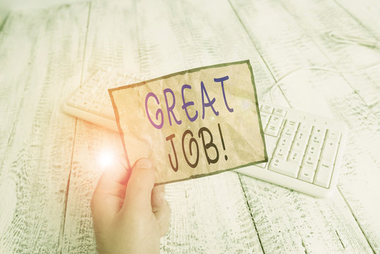 Conceptual hand writing showing Great Job. Concept meaning used praising someone for something they have done very well Man holding colorful reminder square shaped paper wood floor