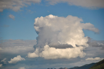 Fototapeta na wymiar big square white cloud in the blue sky