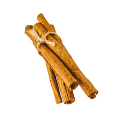 a bunch of sticks of fragrant aromatic cinnamon isolated on white. Very pleasant taste when...