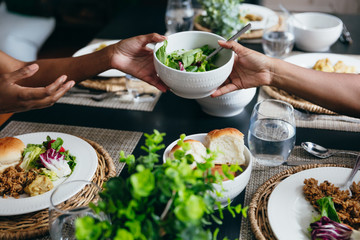 Dinner table setting with Caribbean food