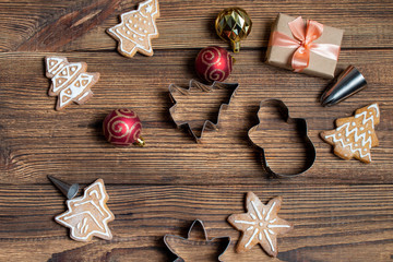Handmade cookies gift box on a dark wooden dark background. The concept of preparing for the holidays New Year and Christmas.