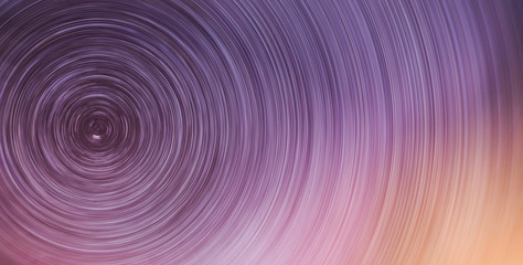 Fototapeta premium Beautiful starry sky with star trails orientation on the north star. Space background. Abstract long exposure background.